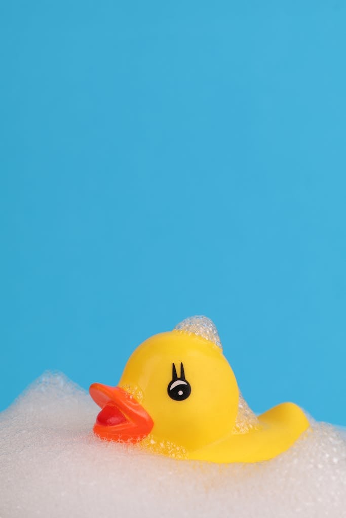 Yellow Rubber Duck on White Foam